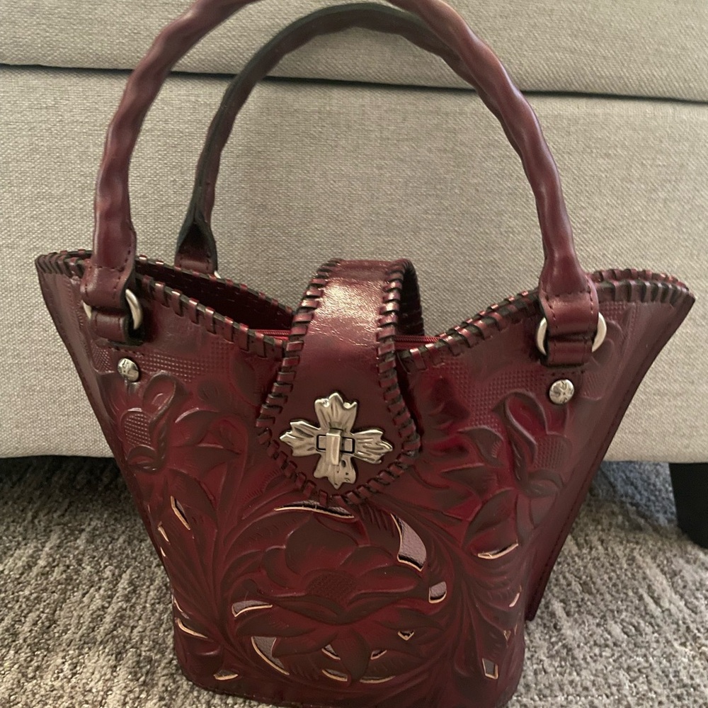 Patricia Nash Ninetta Cut Out Tooled Leather V-Shaped Hand Bag in Oxblood